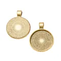Close-up of golden 25mm round alloy bezel pendants with radial texture for DIY jewelry - Antique Gold
