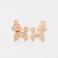Detailed front and back views of a poodle enamel charm with golden metal texture - Ivory