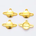 Set of four gold Saturn planet charms for DIY jewelry making with metallic finish - Gold