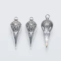 Vintage silver bird skull pendants with baroque carvings and hollow back design - Antique Silver