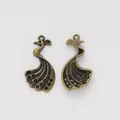 Pair of vintage peacock charms in bronze-finished alloy for DIY jewelry making - Antique Bronze