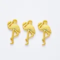 Three gold-plated flamingo metal charms with detailed feather textures for DIY jewelry - Gold