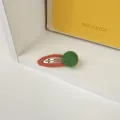 Clip de mohair naranja para invierno con detalle de pompón verde en contraste vivo - Pompon Verde