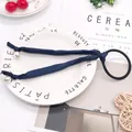 Elegant navy blue hair scrunchie with long ribbons and white pearl pendants - Pure Navy