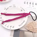 Magenta hair scrunchie with polka dots, flowing ribbons, and elegant faux pearls - Rose Red With Green Dots