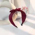 Solid wine red satin bow headband with a wide fabric design and non-slip ends - Red
