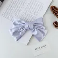 Elegant lilac satin bow hair clip in lavender silk finish with a cute fairy style - Blue