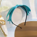 Detailaufnahme des tiffanyblauen Haarreifs mit mehrlagiger Schleife und Rippenstruktur - Himmelblau