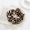 Elastic zebra print scrunchie made of soft fabric for stylish hair styling - Scrunchie / Zebra Brown Scrunchie
