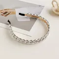 Fashionable chunky silver chain headband with gold accents and protective black ends - Silver
