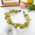Olive green satin ruched headband with elegant silk texture and inner black tips - Fluorescent