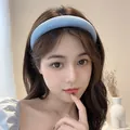 Light blue padded sponge headband on model, thick Korean style fabric hair accessory - Light Blue