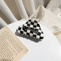 Checkered black and white acetate hair claw clip with stylish checkerboard pattern design - Oval Hollow Large Lattice