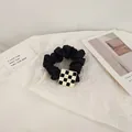 Minimalist black satin scrunchie with a retro black and white checkered square charm - Black Square