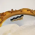 Black and white wave-shaped acrylic hair clip with gold metal duckbill clamp - Black Curved Wave