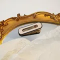 Pink and black checkerboard pattern acrylic hair clip on a vintage gold mirror - Beige Oval Hollow Out