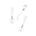 Close-up of three silver miniature spoons with beaded edges for DIY jewelry making - Antique Silver Spoon