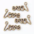 Set of four vintage bronze LOVE letter pendants with antique finish for DIY jewelry crafts - Antique Bronze