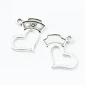 Silver vintage alloy heart and nurse hat charms for DIY jewelry making with cross emblem - Antique Silver