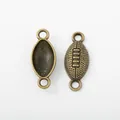 Vintage bronze rugby ball pendants in zinc alloy for DIY jewelry and crafts making - Antique Bronze