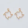 Detailed close-up of light gold geometric windmill charms for DIY jewelry making - Light gold