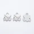 Detailed macro view showing the front and back of silver I Love You heart pendants - White K/Silver