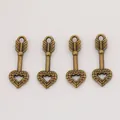 Set of four vintage bronze heart and arrow pendants for DIY jewelry making and crafts - Antique Bronze