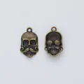 Vintage bronze zinc alloy skull pendant with mustache detail showing front and back views - Antique Bronze