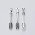 Three vintage silver zinc alloy arrow pendants with double rings and relief textures - Antique Silver