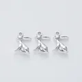 Detailed macro view of three vintage silver alloy rabbit charms for DIY jewelry making - Antique Silver