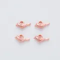 Set of four rose gold vintage bird charms with detailed wings for DIY jewelry making - Rose Gold