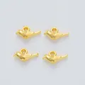Set of four vintage golden bird alloy pendants with detailed feathers for DIY jewelry making - Gold