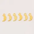 Detail view of gold alloy crescent moon face charms with top hanging loops for jewelry making - Gold