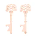 Detail of two rose gold vintage key bottle openers with ornate scrollwork on white background - Rose Gold