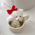 White teddy bear plush with red bow in ceramic mug, cute hair clip variant detail - Style D