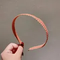 Slim pleated coral orange headband with wave-cut fabric texture for women and girls - Brick Red