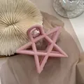 Matte pink star-shaped hollow hair claw clip with strong metal spring for daily styling - Pink