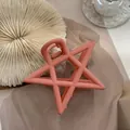 Roze matte ster haarklem met metalen veer voor een elegante en stijlvolle haarstijl - Oranje