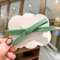 Cute Korean style bow hair clip in dark green fabric with elegant ribbed texture - Green