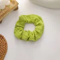 Sweet grass green waffle knit scrunchie with soft ruffled texture for women - Fruit Green