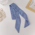 Blue organza scarf with dark green polka dots and textured check pattern on white surface - Blue 2