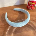 Light blue waffle textured padded headband with candy color design on wood background - Sky Blue