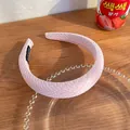 Pink honeycomb textured padded headband with handmade label on wooden surface - Light Pink