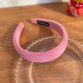 Rose pink sponge headband with waffle texture and handmade label on wooden background - Rose Pink