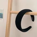Diadema gruesa de esponja negra para efecto de volumen con etiqueta artesanal - Negro