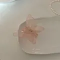 Molla per capelli a farfalla rosa chiaro traslucido in resina opaca con dettaglio oro - Farfalla Nude