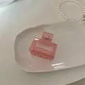 Pinza per capelli rosa traslucida con design quadrato vuoto su vassoio in ceramica - Quadrato Rosa