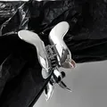 Polished silver metal butterfly hair claw clip with vintage minimalist design - Silver
