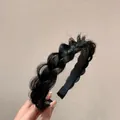 Handcrafted black braided wig headband featuring a synthetic fishtail plait design - Black