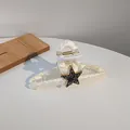 Elegant white satin shark hair claw clip featuring a grey sparkling star decoration - Dark Gray Star Style